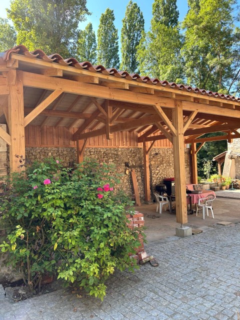 Extension bois en charpente traditionnelle à Pujols
